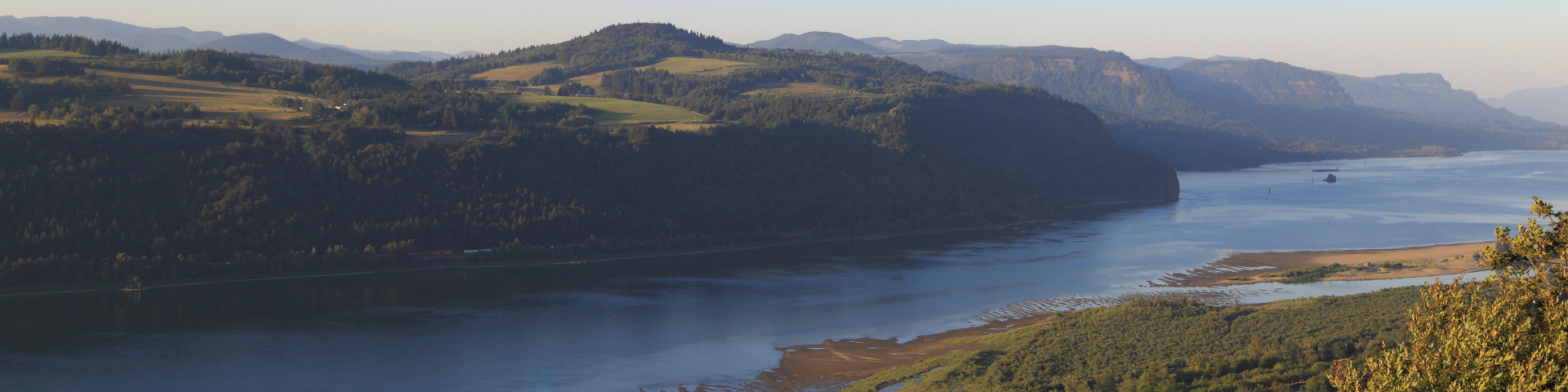 A river snakes through the Columbia gorge